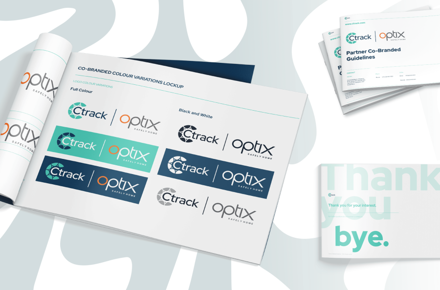 Open booklet displaying co-branded logo variations for Ctrack and Optix in full color and black and white. Nearby are guideline booklets. Background is abstract.