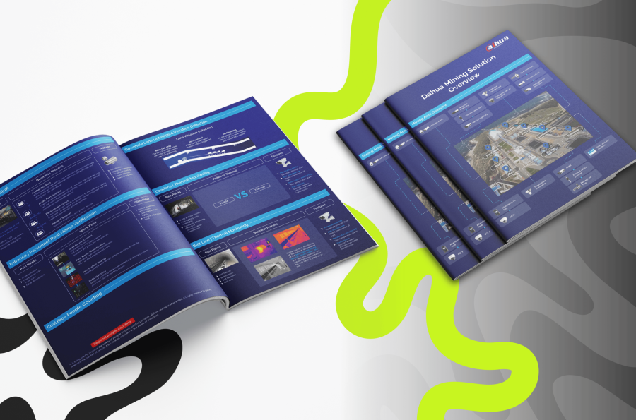 Aerial view of open brochures and closed booklets in a modern style with dark blue covers and technology graphics, against a wavy, abstract background.